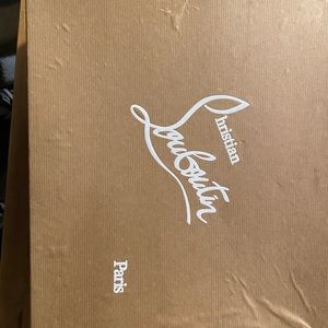 Pik pik black leather w/metal spike Red bottoms.